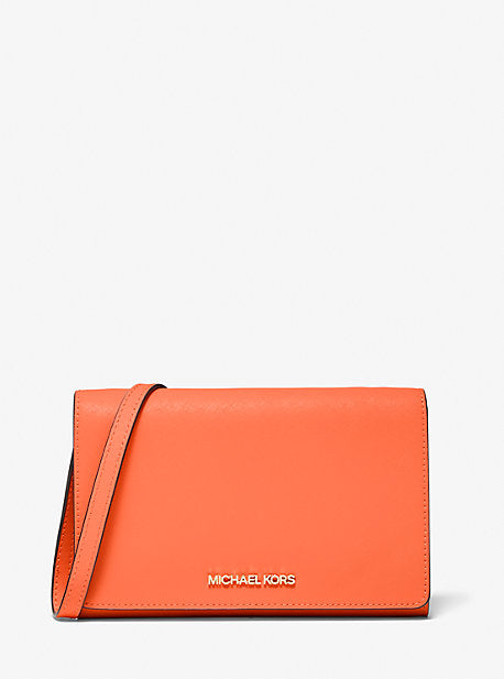 Michael Kors sold orange Crossbody Jetset Saffiano bag